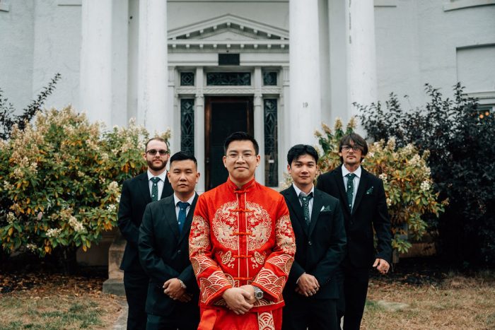 groom in traditional chinese garb with his friends 